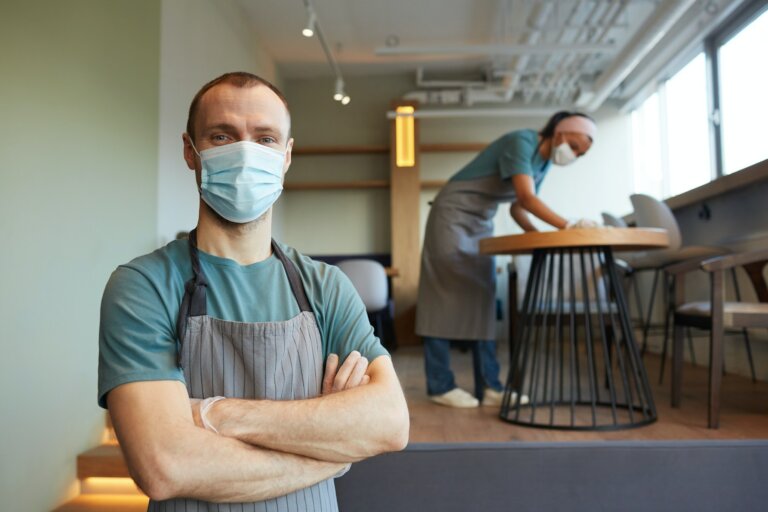 Waiter Wearing Mask in Cafe